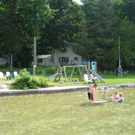 Family Playing in Lake